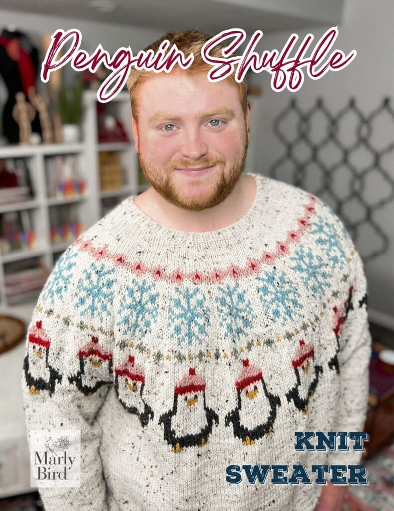 A smiling man with a reddish beard wears a white knit sweater featuring rows of penguin designs and blue, red, and gray patterns. Text on the image reads "Penguin Shuffle" and "KNIT SWEATER. -Marly Bird