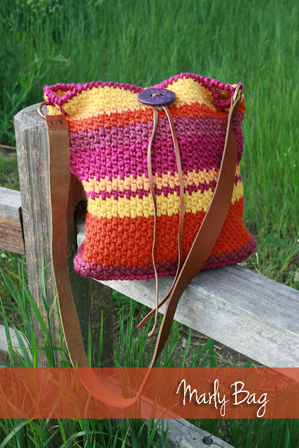 Marly Bird Bag, crocheted in fibonacci color sequence and leather belt used for strap