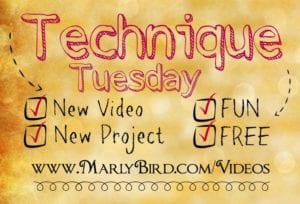 Colorful promotional graphic titled "Technique Tuesday" with checkmarks next to "Extended Single Crochet," "New Project," and "FUN FREE." The website "www.MarlyBird.com/Videos" is displayed at the bottom. -Marly Bird