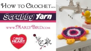 Collage highlighting crochet techniques featuring a graphic titled "How to Crochet with Scrubby Yarn" by MarlyBird.com, a heart logo from Red Heart, and an image of a crochet scrubby next to a sink with a rubber duck. -Marly Bird