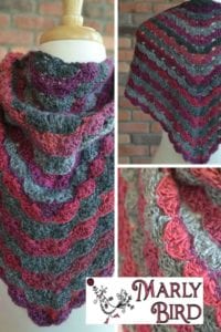 A collage of images featuring a multicolored crocheted shawl with ripples in shades of pink, purple, and gray, displayed on a mannequin and close-up views of the texture, with a logo for "Marly Bird. -Marly Bird