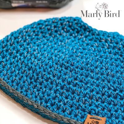 FREE Crochet Messy Bun Hat using Red Heart Reflective Yarn