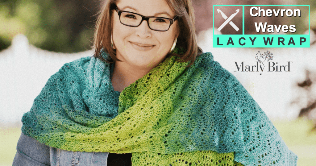 Crochet Wrap in lime greens and teal blues draped around the shoulders of the model. Showing off the Pattern-Chevron Waves Lacy Wrap - Marly Bird