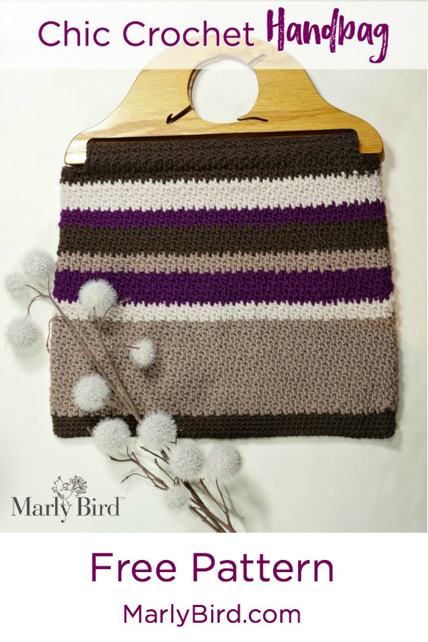 simple striped crochet bag with wooden handle.