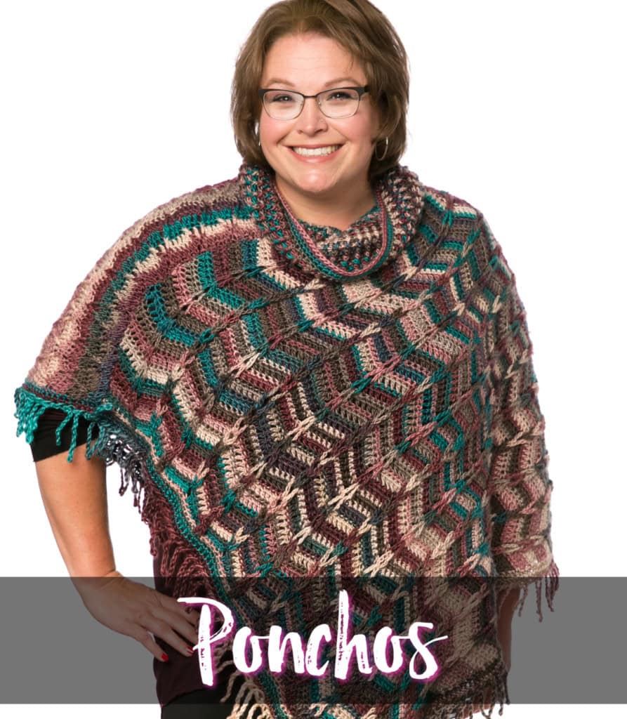 Marly's crochet-along with Red Heart yarn Unforgettable - Marly Bird wearing south west style and colored poncho, white background. Poncho colors: beige, browns, teal.