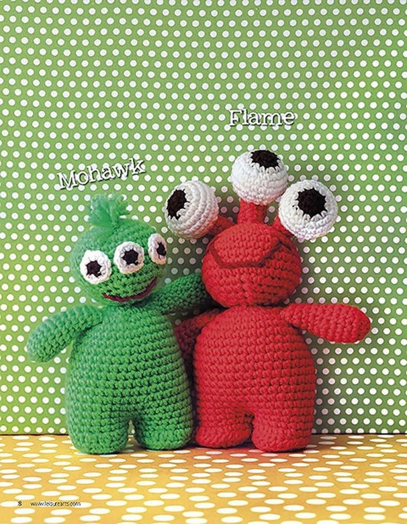 red and green amigurumi monsters