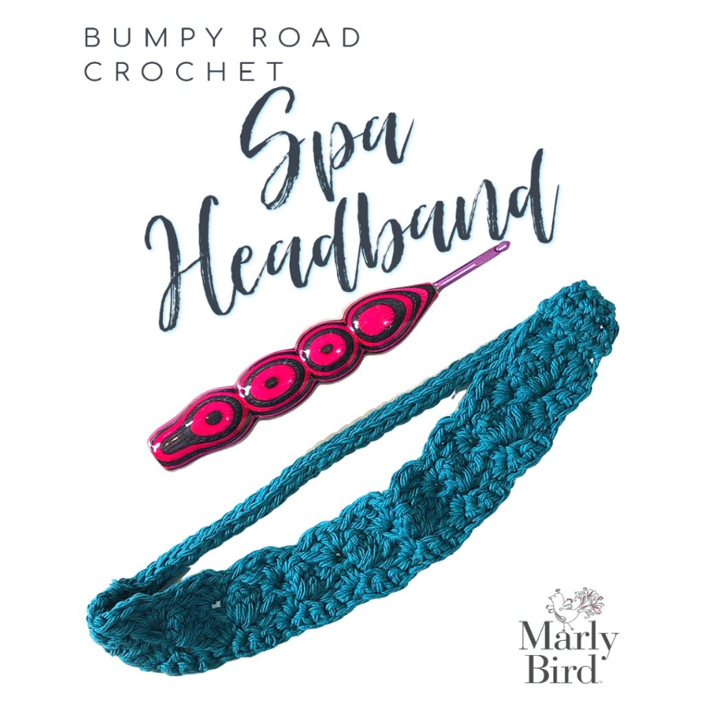 Teal crochet headband with intricate stitch pattern, displayed alongside a pink crochet hook and decorative pink text saying "bumpy road crochet spa headband by marly bird.