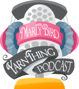 Logo featuring a microphone encased in yarn with a banner reading "Yarn Thing Podcast with Marly Bird," all depicted in vivid colors against a green background. -Marly Bird