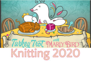 Illustration of a joyful cartoon seal knitting with pink yarn at a wooden table, accompanied by a pie and a bowl of yarn, with text "knitting turkey trot 2020" on a decorative teal background. -Marly Bird