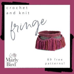 Image featuring a crochet knit fringe neck warmer in shades of purple and gray, accompanied by text "marly bird" and "89 free patterns!" on a white background. -Marly Bird