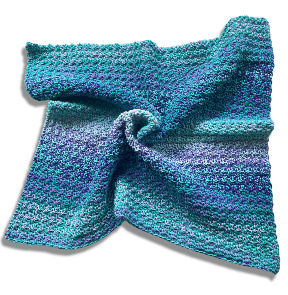 OMBRE Go To Crochet Baby Shower Blanket twisted on a white background
