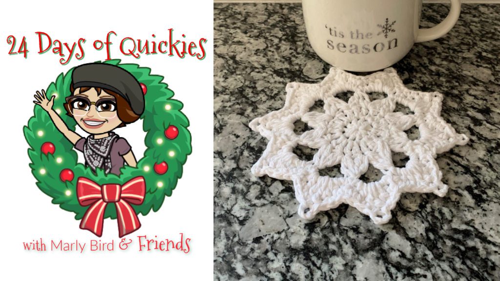 Snowflake coaster against grey granite background with 'Tis the season' mug. Cute crochet gift idea.