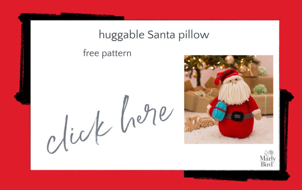 Huggable Santa Pillow Free Crochet Pattern - bowling pin style Santa pillow standing with blue gift under right arm, brown paper-wrapped with presents in background.