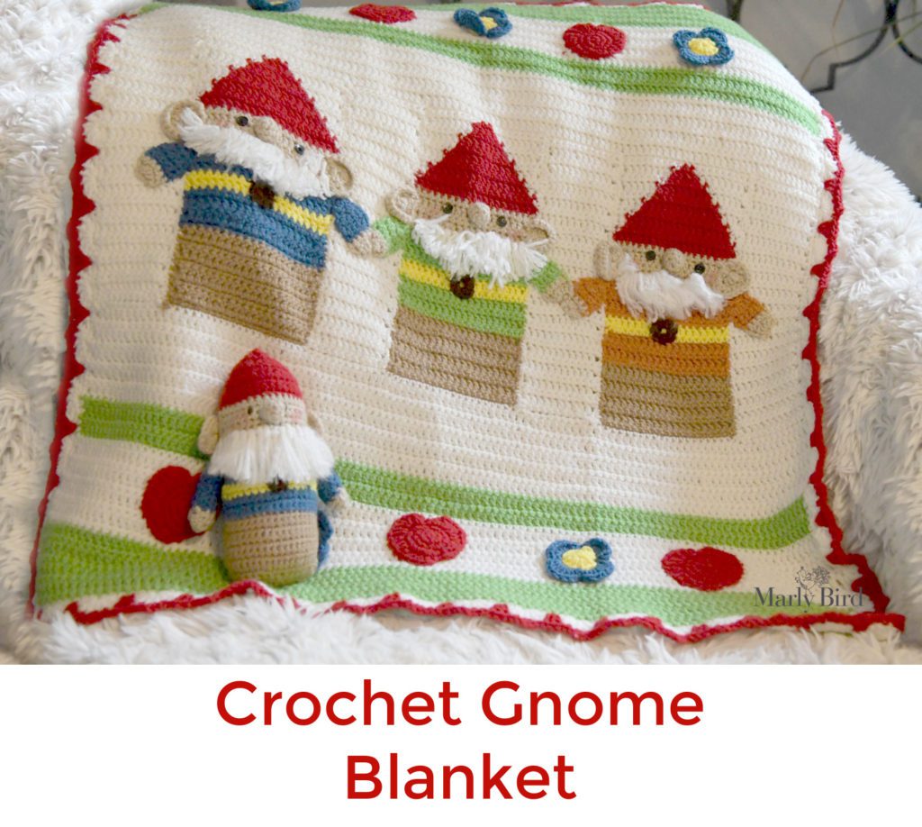 Crochet gnome doll with crochet gnome blanket.