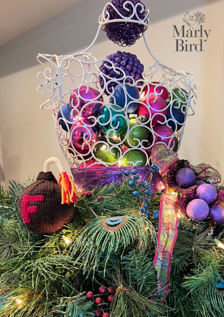 Christmas image with stuffed knit f-bomb.