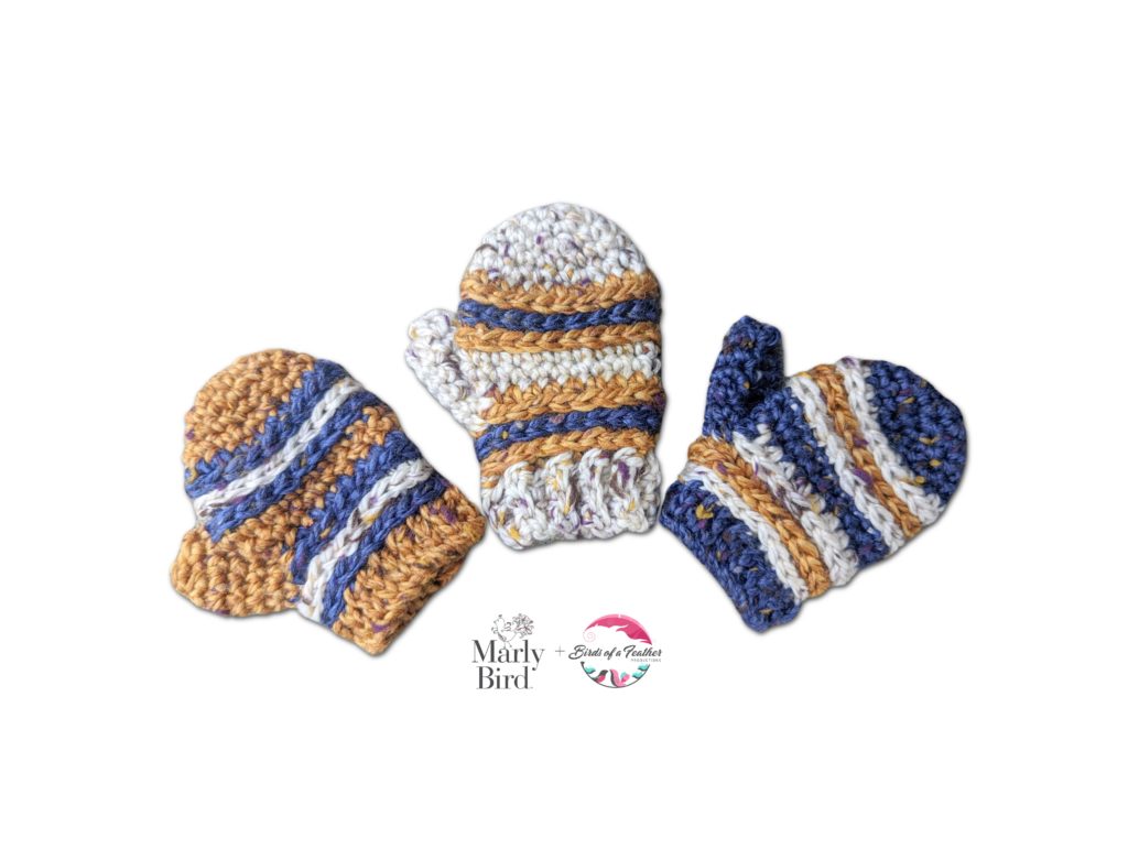 3 crochet mitten ornaments with stripes in different color orders (blue, tan, & white) - free pattern by Marly Bird