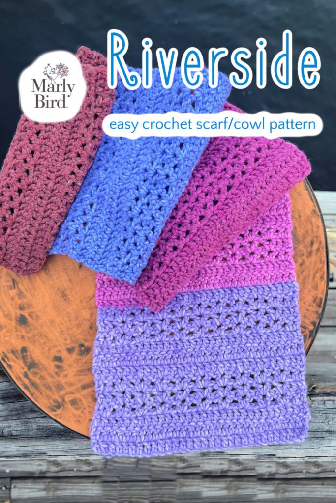 Riverside easy crochet scarf on wood background.