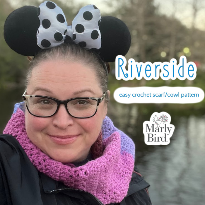 Marly at Disney modeling the Riverside easy crochet scarf.