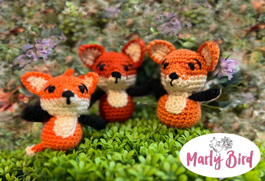 Apricot Lane Amigurumi character Felix the Fox in three different sizes. All use the same Felix the Fox crochet stuffie pattern but different size yarn and hook