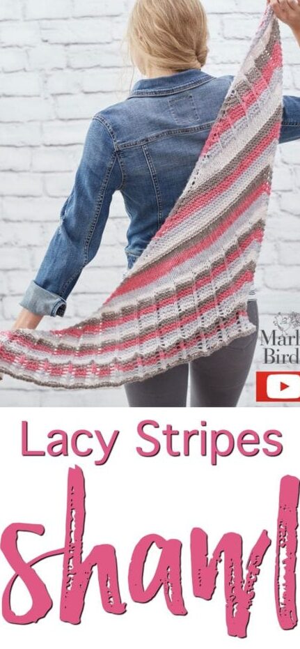 Knit Lacy Stripes Shawl held behind the model and stretched out to see the entire shape of the knit shawl - Marly Bird