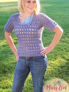 Ashley sweater is a crochet cotton tee shirt style pullover with a asymmetric neckline with a fold over flap held down with a button. This is a premium crochet pattern by Marly Bird