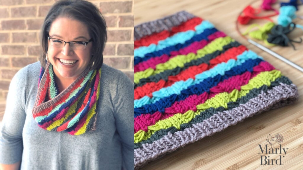 A smiling woman wearing glasses and a colorful knitted cowl stands next to a close-up of the same cowl, showing bright stripes and textured patterns. Knitting materials, a Quickie Knit Hat, and the Marly Bird logo are also visible. -Marly Bird
