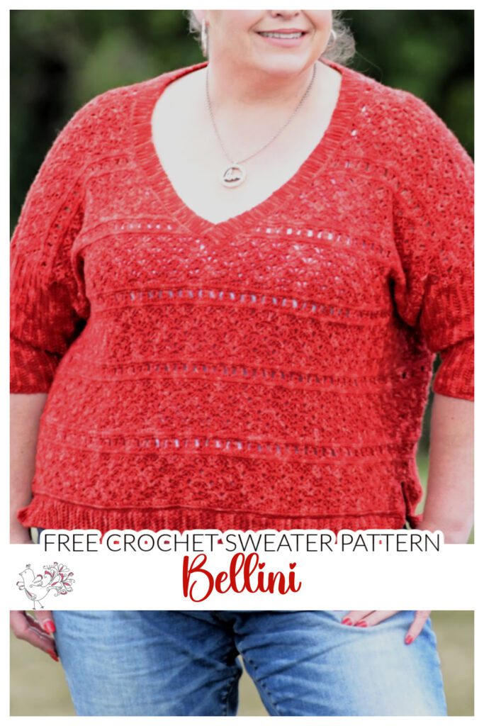 Red crochet sweater on model showing closer shot of 2 different stitch patterns.