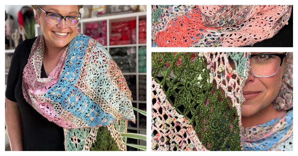 A smiling person wearing glasses and a colorful, lacy crochet shawl in shades of pink, blue, green, and cream. Close-up shots highlight the intricate pattern—perfect inspiration for any bicrafty workshop. Yarn shelves are visible in the background. -Marly Bird