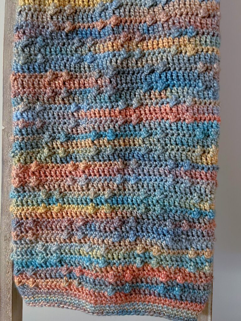 crochet bobbles on the Sandwallen crochet blanket in Caron Blossom Cakes yarn - Marly Bird