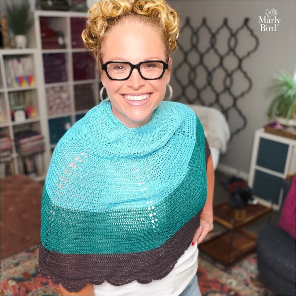 Bluebonnet Crochet Lace Shawl - free crochet lace shawl pattern by Marly Bird in blue, teal, and brown.
