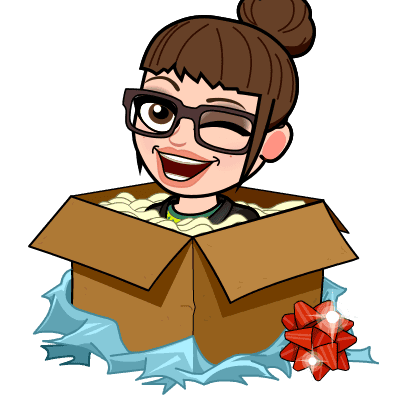 A cartoon woman with glasses and a bun winks from inside an open cardboard box, surrounded by blue wrapping paper and adorned with a red bow. A tiny detail catches the eye—a mini crochet mitten peeks out from beneath the festive wrapping. -Marly Bird