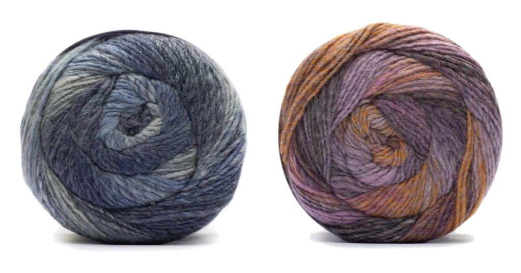 Image displaying two balls of Caron Macchiato Cakes yarn. On the left is the 'Soulful' colorway, featuring shades of blue from deep navy to light heather, creating a serene and sophisticated effect. On the right is the 'Bewitch' colorway, a harmonious blend of pinks, purples, and subtle hints of orange, evoking a warm, enchanting feel. Both yarn cakes show a smooth gradient transition, perfect for creating richly textured and colorful knitted or crocheted garments.