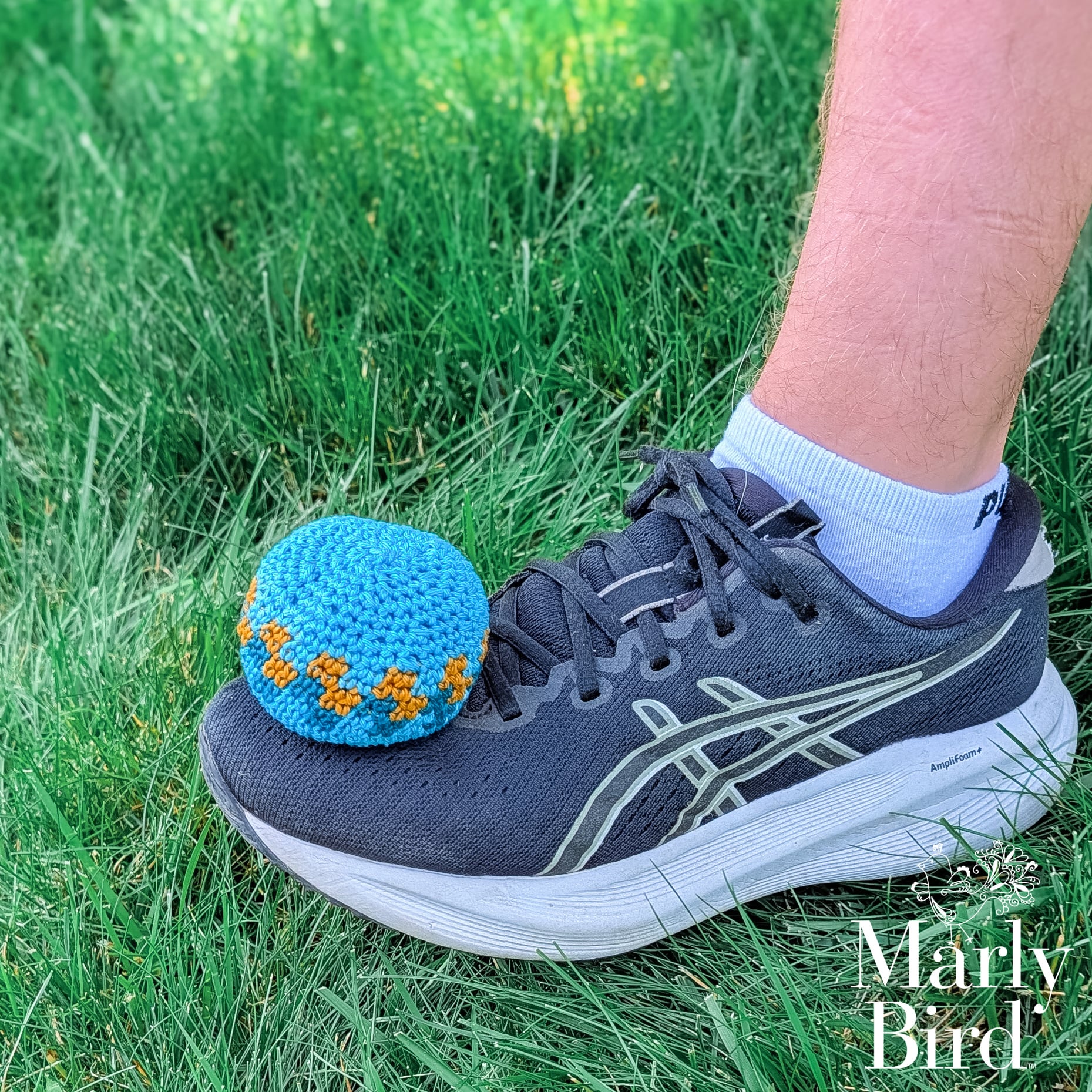 Crochet hacky sack being kicked - Stitch Kickers footbag in action outdoors