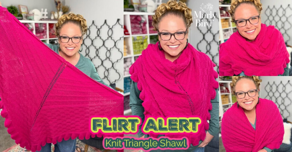 Bright pink worsted shawl shown draped and wrapped; features neat knit texture. Yarn shelves visible behind model.