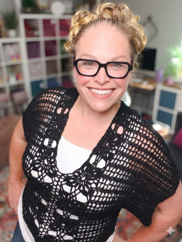 Free crochet floral motif tee pattern in black — size-inclusive lacy summer crochet sweater by Marly Bird