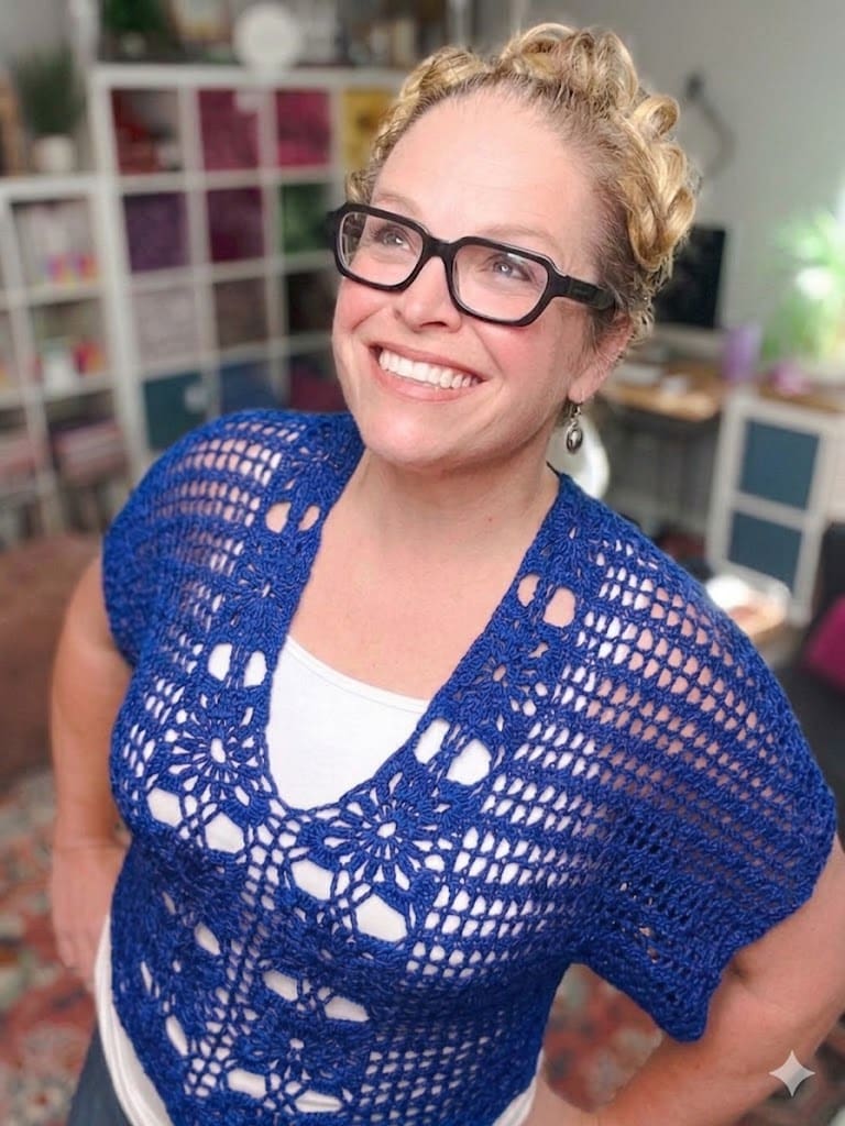 Free crochet floral motif tee pattern in cobalt blue — size-inclusive lacy summer crochet sweater by Marly Bird