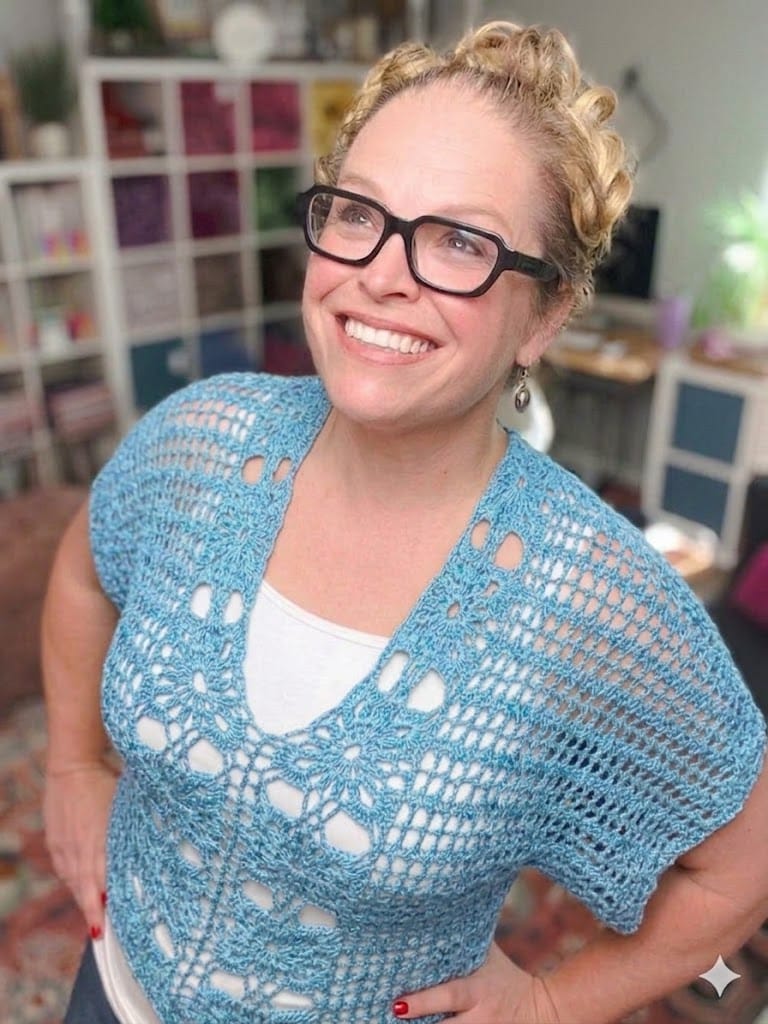 Free crochet floral motif tee pattern in light blue — size-inclusive lacy summer crochet sweater by Marly Bird