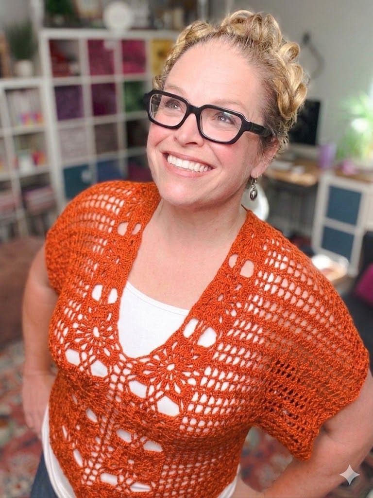 Free crochet floral motif tee pattern in orange — size-inclusive lacy summer crochet sweater by Marly Bird