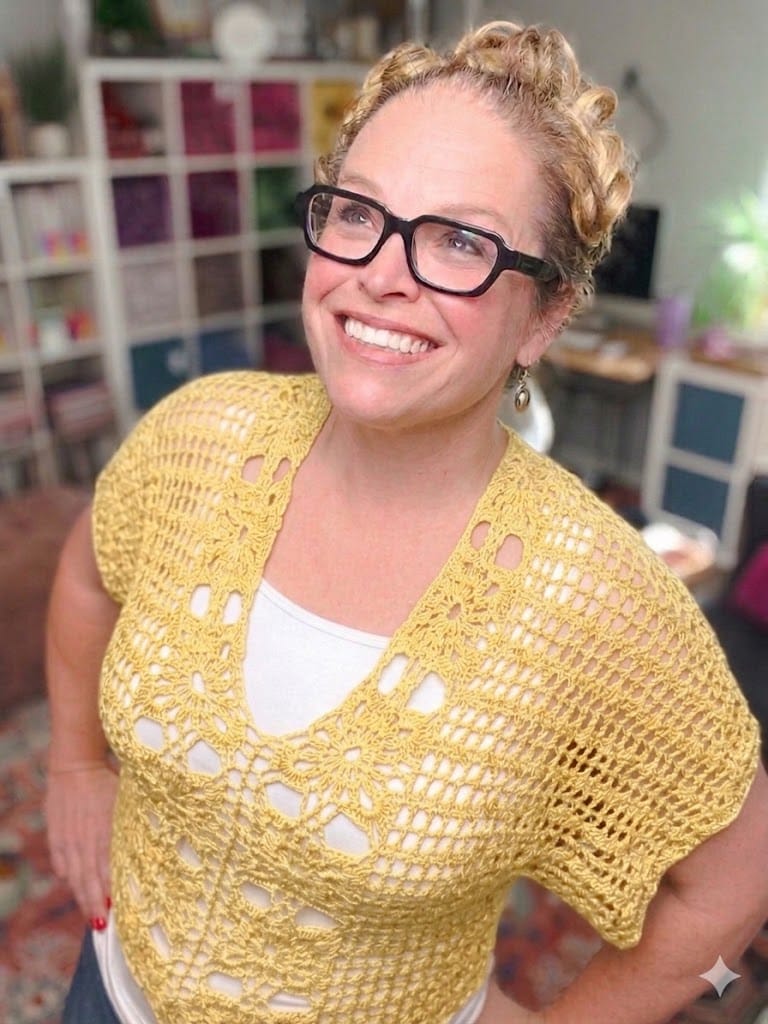 Free crochet floral motif tee pattern in yellow — size-inclusive lacy summer crochet sweater by Marly Bird