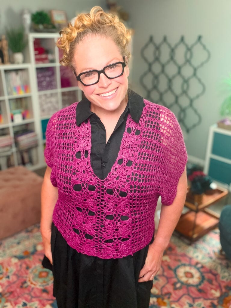 Plus-size crochet floral motif tee free pattern in purple over black dress — size-inclusive summer crochet sweater