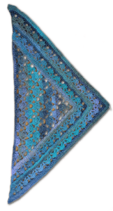 Triangular crochet shawl in blue, teal, and purple with lacy patterns and textured stitches, shown flat on a white surface.