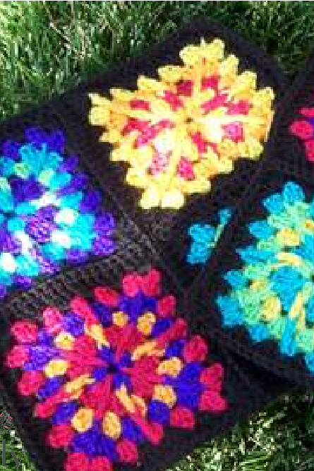 Granny Square motifs joined together to make colorful 4 motif panels for the Granny Square Pucker Purse by Marly Bird - free Crochet pattern