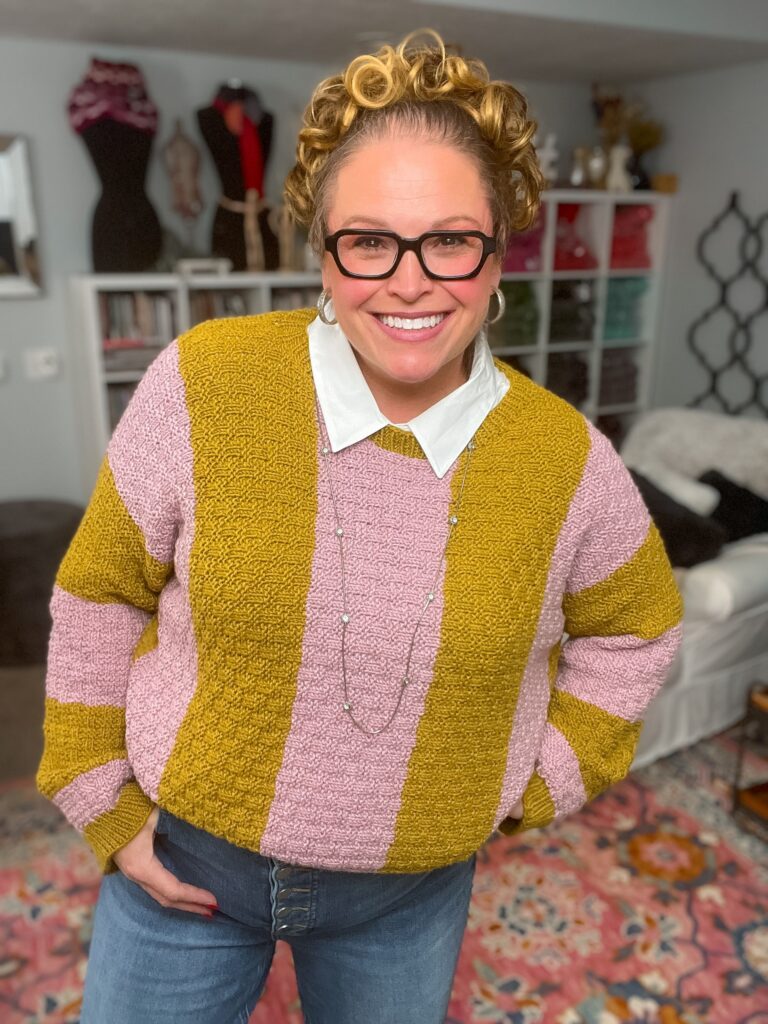 Model wearing the Hello Again Knit Sweater with stranded colorwork bands — free colorwork knit sweater pattern