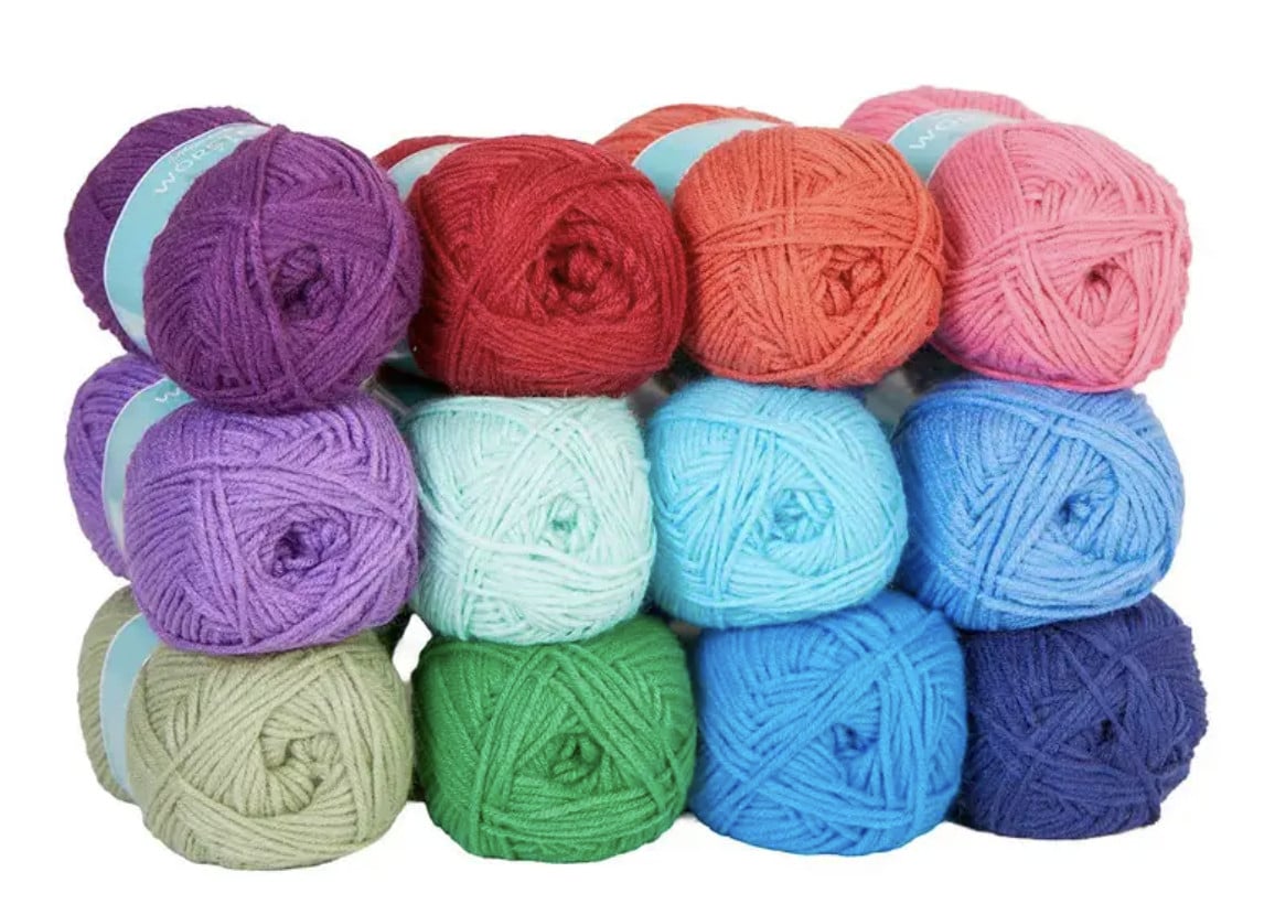 Herrschners Worsted 8 yarn in multiple colors — used in the Wildflower Hexagon Motif Crochet Blanket