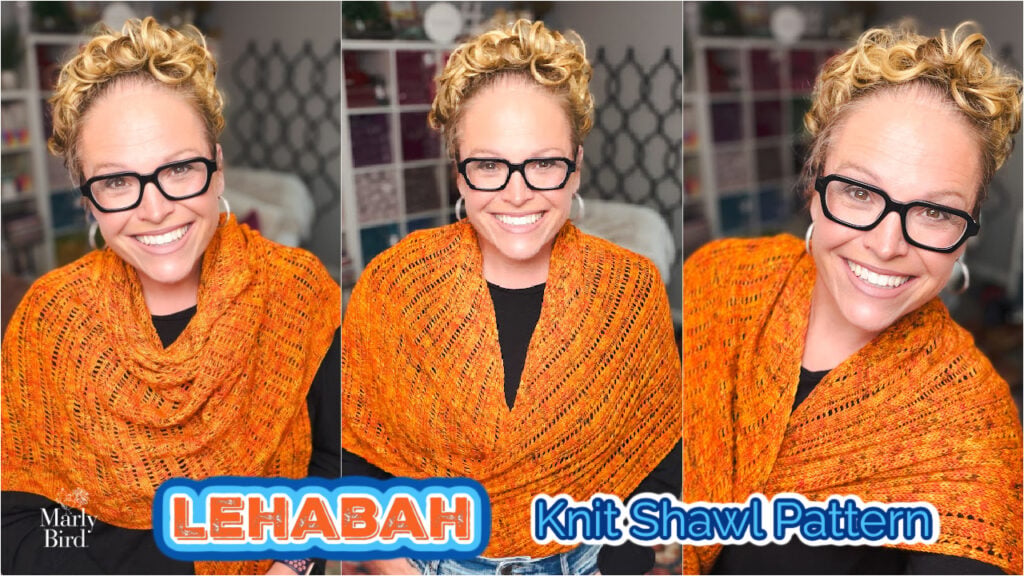 Woman with curly blonde hair showcases the orange Lehabah Fire Sprite knit shawl, highlighting stitch detail and drape.