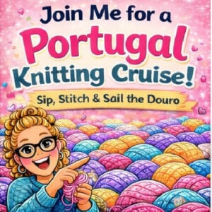 Smiling woman with glasses holds knitting needles, surrounded by colorful yarn balls, on a pink background.