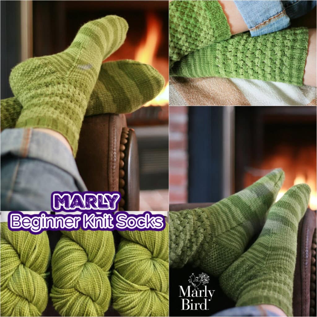 Warm green beginner knit socks on feet near fireplace, cozy home knitting project, Marly Bird knitting tutorial, easy beginner socks.