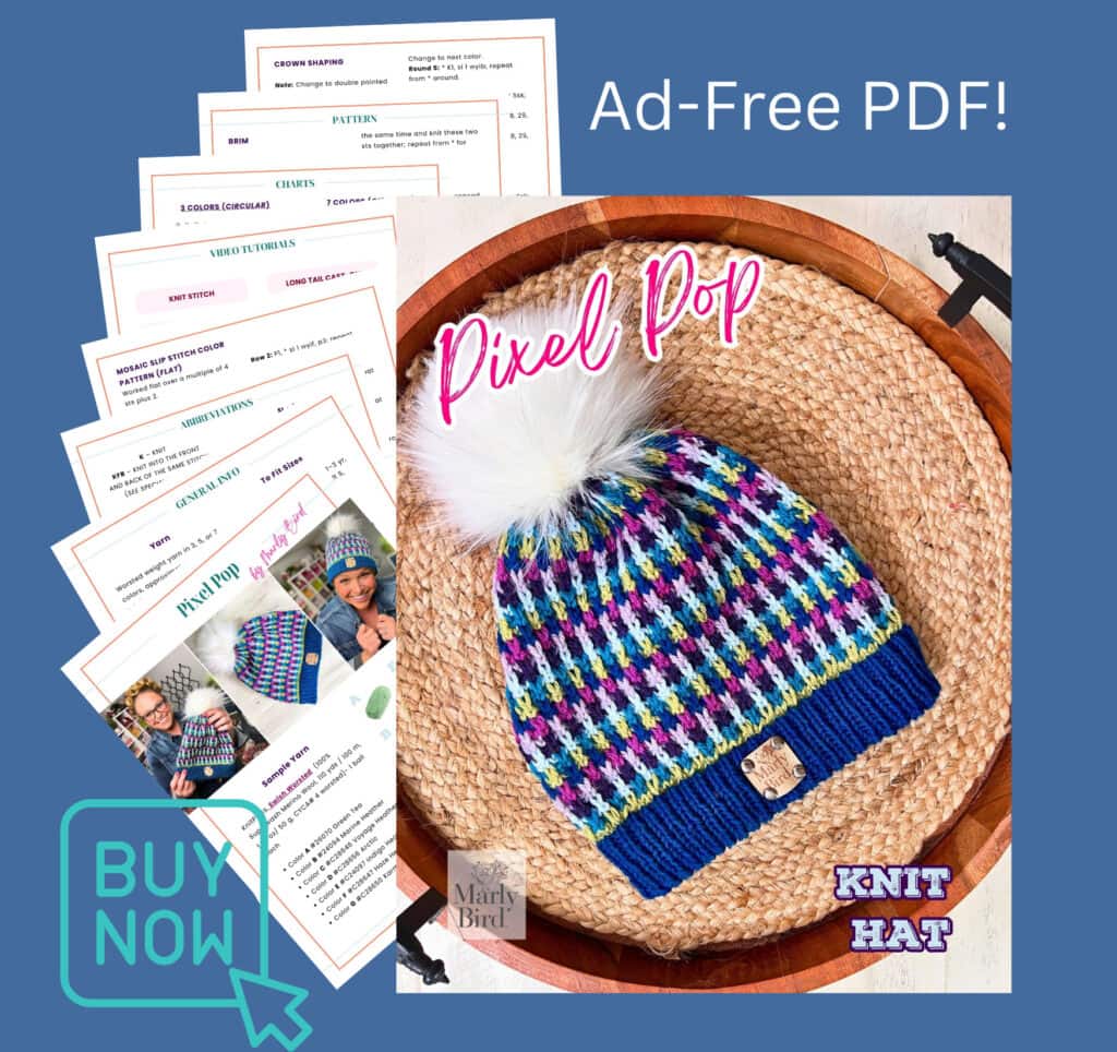 A colorful pixel pop knit hat with a pom-pom is displayed on a woven mat. The image advertises an ad-free PDF pattern called “Pixel Pop,” alongside printed pattern pages and a "Buy Now" button on a blue background. -Marly Bird