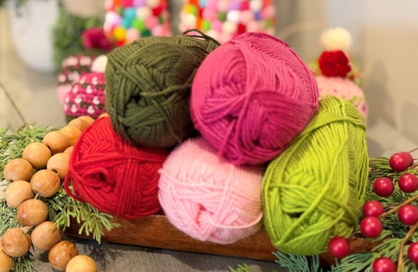 Premier Anti-Pilling Everyday Worsted yarn in holiday colors for Merry Mischief crochet ornament