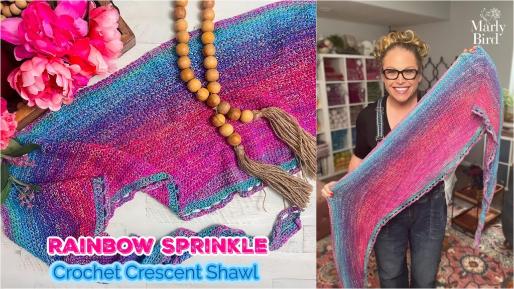 Woman models a crochet crescent shawl in bright pink, blue, and purple; another shawl is adorned with flowers and beads.